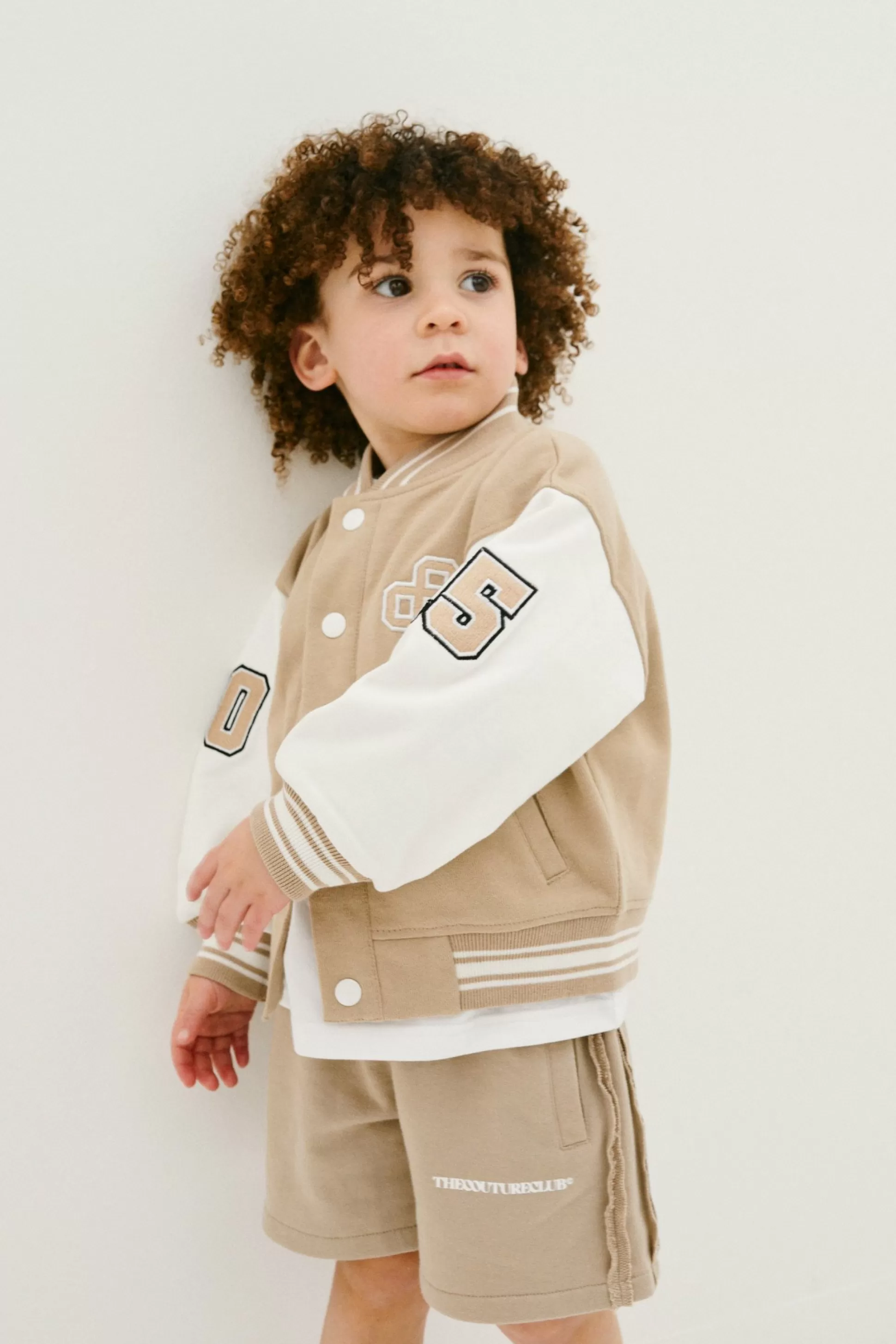 The Couture Club Kids Emblem Varsity Bomber Jacket