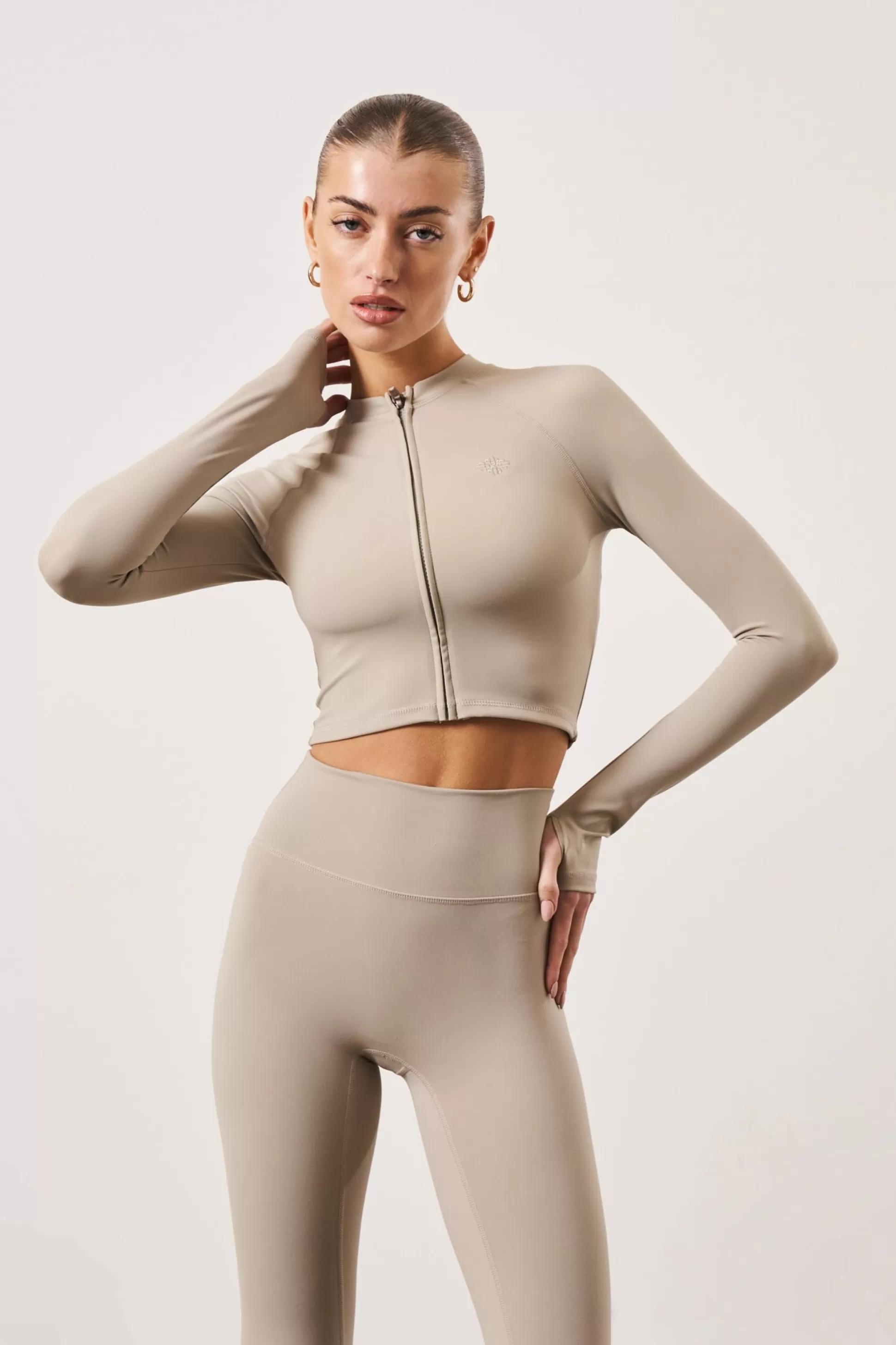 The Couture Club Sculpting Emblem Zip Through Top