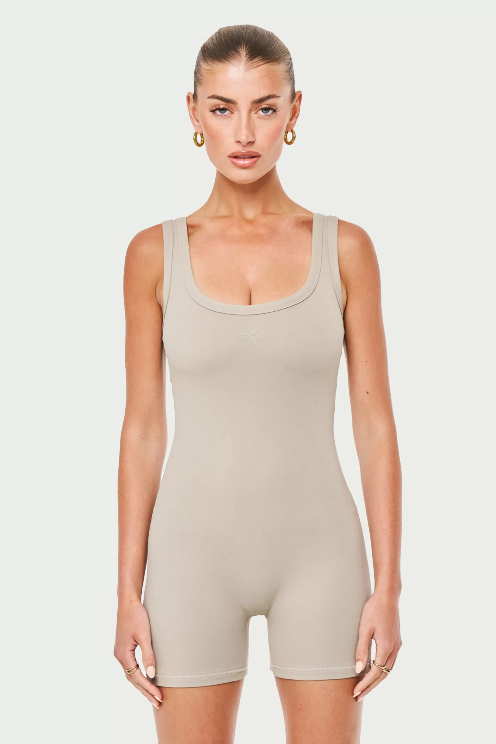 The Couture Club Sculpting Stretch Emblem Unitard